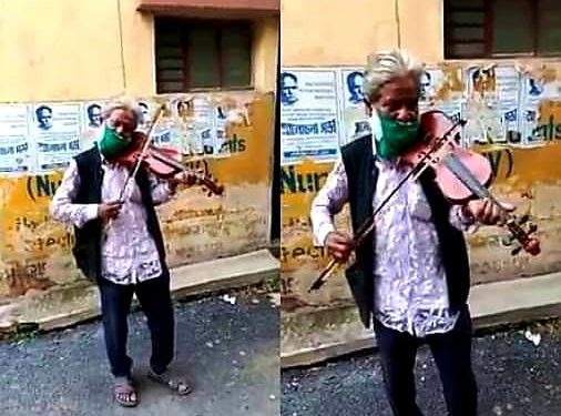 পেশা নয় ‘নেশা’, লকডাউনে মালদার রাস্তায় রাস্তায় সুর তুলে চলেছে ‘ভগবান’-এর বেহালা!