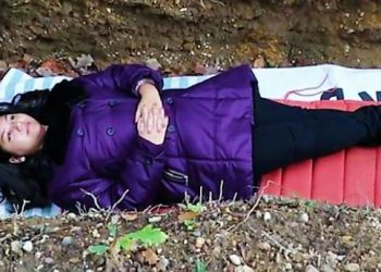 Daily News Reel - Alive Girl Lie Down in Grave