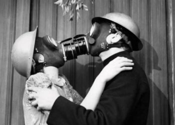 Daily News Reel - Anti War Gas Mask Kiss Feature