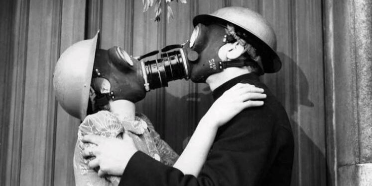 Daily News Reel - Anti War Gas Mask Kiss Feature